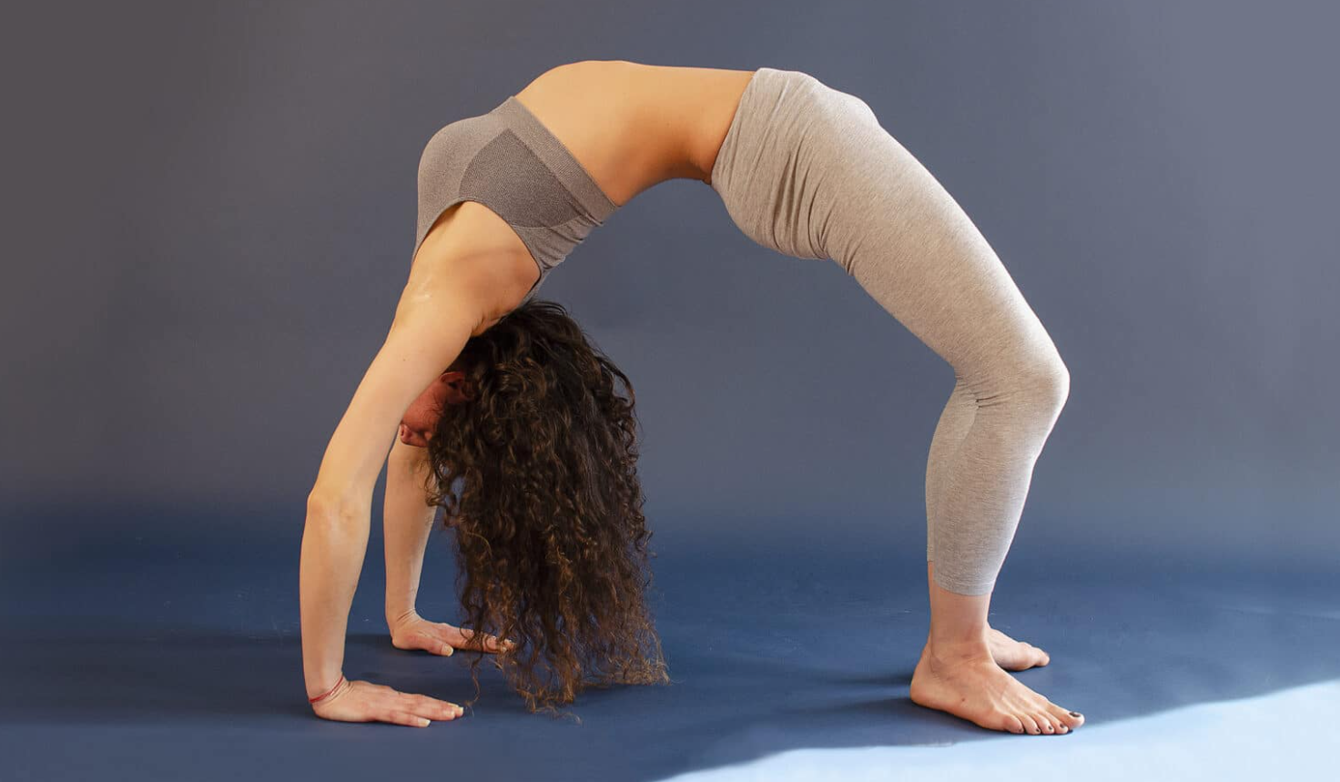 Pregnant woman practicing safe prenatal yoga